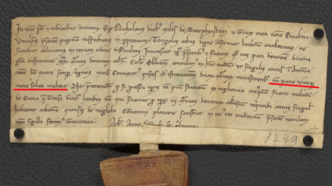 Mittelalterliche Urkunde, handgeschrieben, mit einem anhängenden Wachssiegel