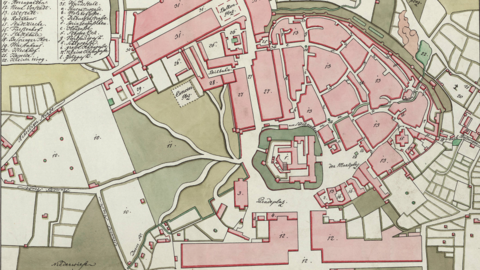 Historischer Stadtplan: Darstellung der bebauten Fläche, der Straßen und der Grünanlagen in unterschiedlichen Farben